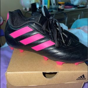 Girl like new soccer cleats.